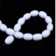 Oval glass beads 15x10mm Milk white